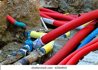 Underground construction of pipes hoses and cables