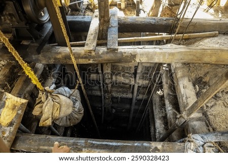 underground digging place and using wood bar to hold all the four side wall