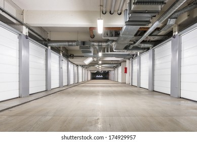 Underground European storage and parking facility with numbered bays. - Powered by Shutterstock