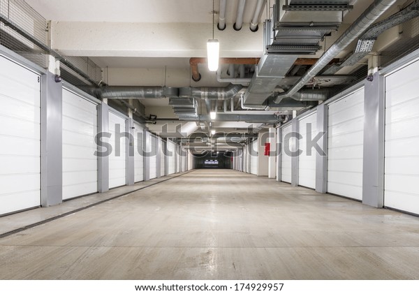 Underground European storage and parking facility\
with numbered bays.