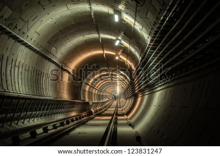 Similar – Foto Bild Metallischer dunkler Tunnel mit Licht am Ende