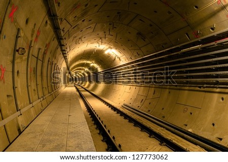 Similar – Foto Bild Metallischer dunkler Tunnel mit Licht am Ende