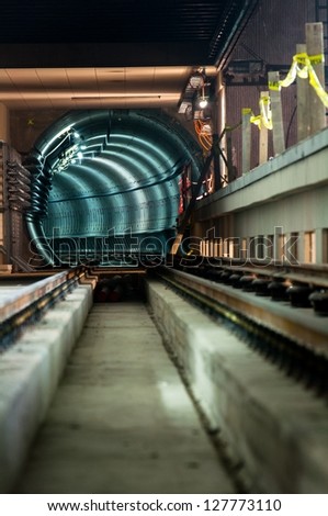 Similar – Foto Bild Metallischer dunkler Tunnel mit Licht am Ende