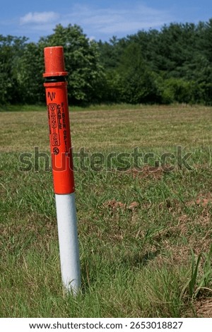 Underground fiber optic cable post