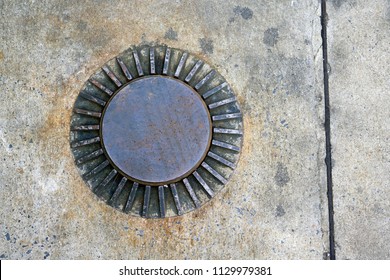 Underground Fuel Tank Cap At Gas Station