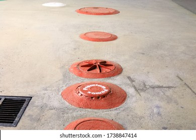 Underground Fuel Tank Covers At Local Gas Station