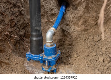 Underground Installation Of Saddle Clamp Valve For Steel And Cast Iron Pipelines Attached To City Main Pipe With Connecting Pipe For The House Service Line, Suitable For Gas And Water Home Systems