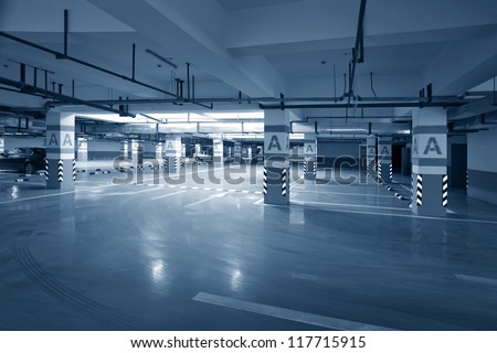 Similar – Empty multi-storey car park with yellow columns