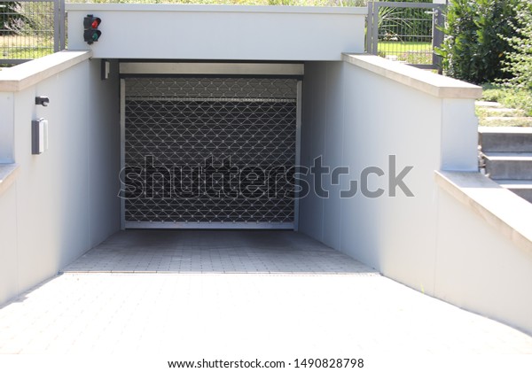 Underground Parking Entrance Roll Door On Stock Photo Edit Now