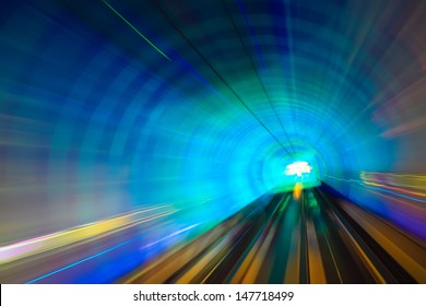 underground rail tunnel with light show in shanghai