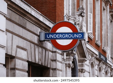 Underground sign on one of London's buildings - Powered by Shutterstock