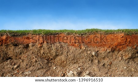 underground soil layer of cross section earth, erosion ground with grass on top