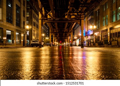 Underneath The Elevated Train Tracks At Wells Street In The Chicago Loop At Night.