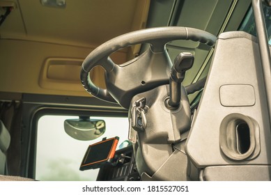 Underneath View Of Open Cab Interior Big Truck With Steering Wheel On Front