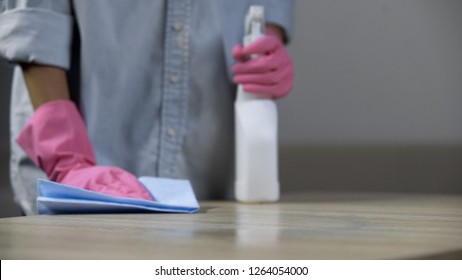 Underpaid Worker Cleaning A Dirty Desk In School Cafeteria, Low-paid Occupation