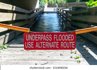 Underpass Flooded Warning Sign At Salt Creek In Oak Brook Illinois