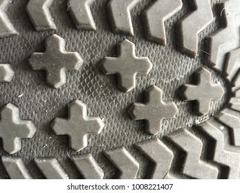 Underside Of Boot Traction Tread Sole Brown Shoe Leather Rubber Grip Dirty Walking Hiking Background Texture