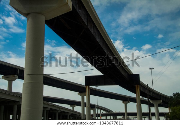 Underside\
of highway. View of the the overpass in\
Houston