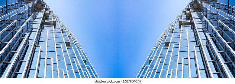 underside panoramic and perspective view to steel blue glass high rise building skyscrapers, business concept of successful industrial architecture