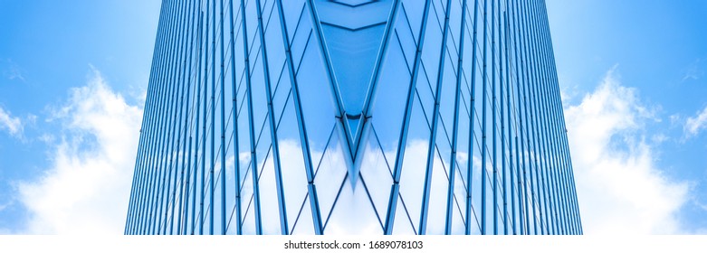 underside panoramic and perspective view to steel blue glass high rise building skyscrapers, business concept of successful industrial architecture