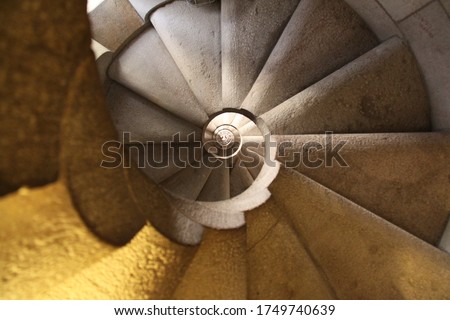 underside of a spiraling stair case in a tower