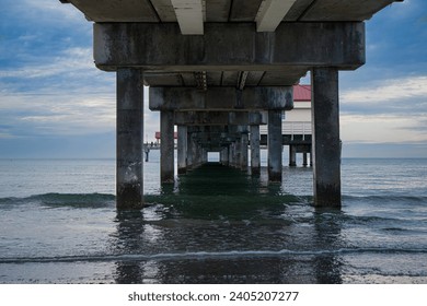 Underside view of beach pier
