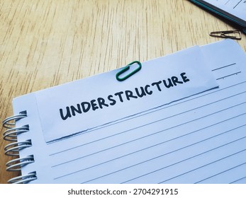 Understructure writting on table background.