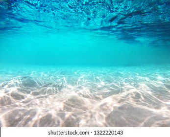 Underwater blue sea scene with sun ray background  - Shutterstock ID 1322220143