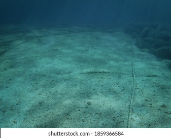 Underwater cables on the ocean floor in the Mediterranean Sea. 
