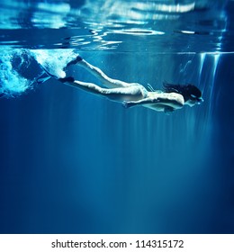 Underwater Diver Isolated On Blue Background