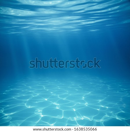 Underwater empty swimming pool background with copy space