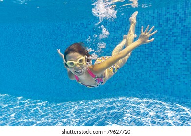 Underwater Kid In Swimming Pool