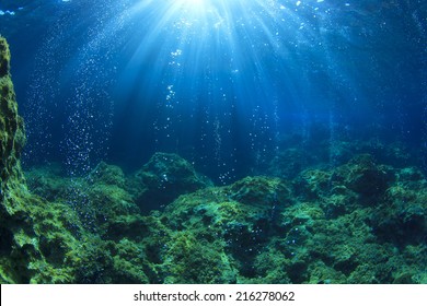 Underwater ocean scene with air bubbles, unfocused