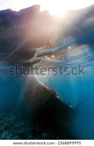 Underwater photo of shipwreck on coral reef in red sea