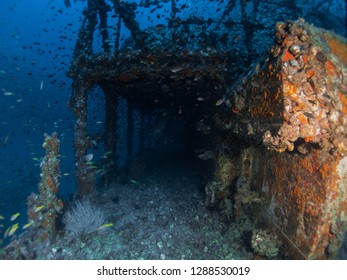 Underwater photography of sunken ship wreck at Gulf of Thailand. There are many fish at the ship wreck like aquarium and feel mystery.  - Powered by Shutterstock