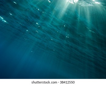 The Underwater Picture With The Rays Of Light From The Surface To Depth