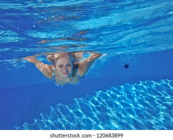 Underwater Picture Of Swiming Woman