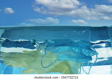 Underwater pollution, used medical waste in ocean water, environmental and ecology concerns - Powered by Shutterstock