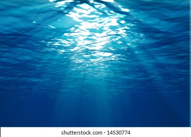 An Underwater Scene With Sun Rays Shining Through The Water