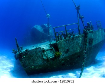 Underwater Shipwreck Tibbits In Cayman Brac With Guns