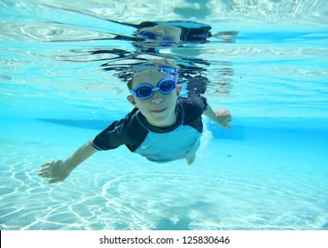 Underwater Shot Of Boy Swimming