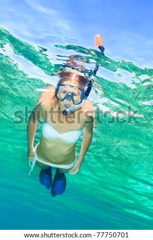 Underwater shot of a snorkeling beautiful woman