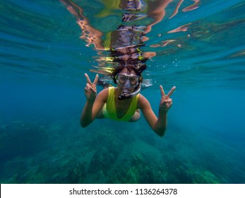 Underwater Snorkeling Woman In Maui Hawaii