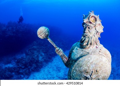 Underwater Statue with Background Scuba Diver - Powered by Shutterstock