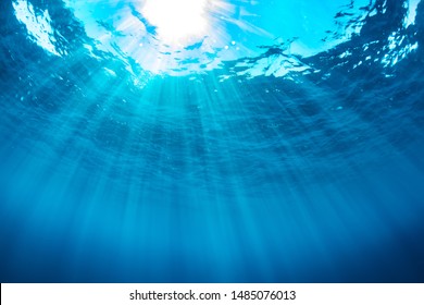 Underwater Sun Light Beam With Blue Sea
