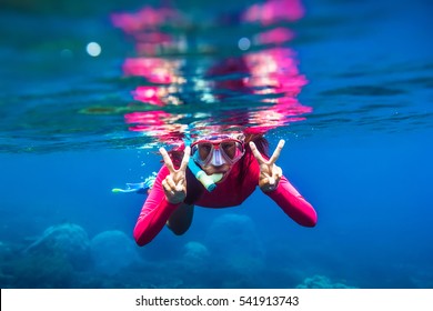 Underwater Swimming In Ocean