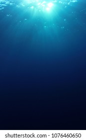 Underwater vertical background photo - Shutterstock ID 1076460650