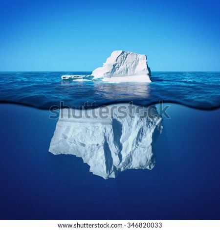 Underwater view of iceberg with beautiful transparent sea on background