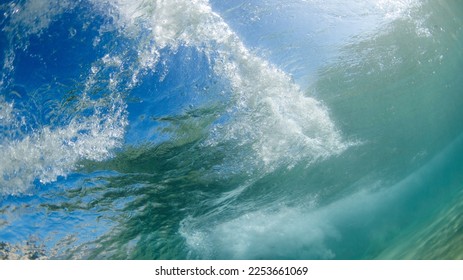 Underwater view of underneath a wave.