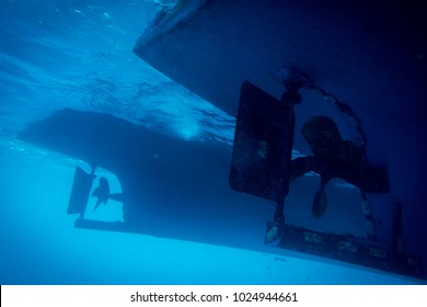 Underwater View To Yacht Rudder And Prop, Scuba Diving Concept